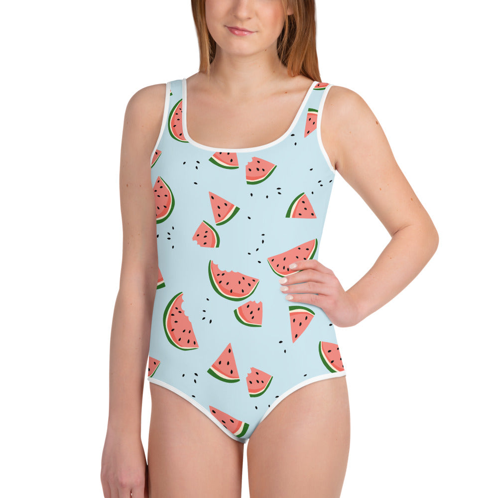 http://www.starcovefashion.com/cdn/shop/products/all-over-print-youth-swimsuit-white-front-617fc12964e51.jpg?v=1635762477